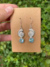 Load image into Gallery viewer, Sterling Silver Nautilus Shell With Faceted Blue Topaz Earrings
