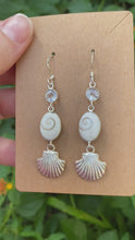 Load and play video in Gallery viewer, Sterling Silver Seashell Earrings With Faceted Clear Quartz
