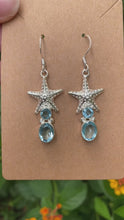 Load and play video in Gallery viewer, Sterling Silver Starfish With Blue Topaz Earrings
